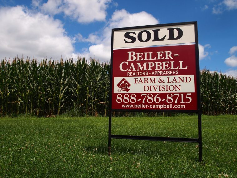 real estate brokerage services sold sign